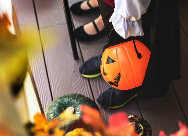 istock Little children trick or treating on Halloween 1055437498