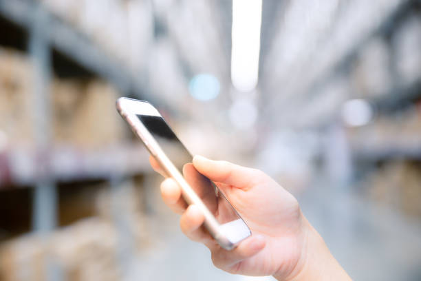 istock Close up of female hands using smart phone 1055439918