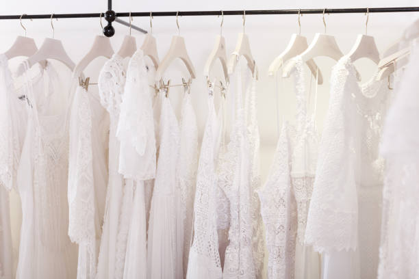 istock Wedding dresses in wedding salon 1055448498