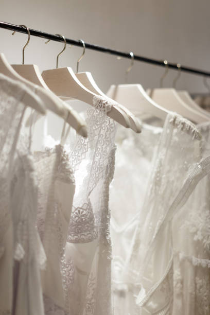 istock Wedding dresses in wedding salon 1055448510