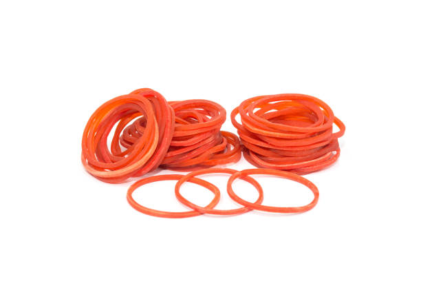 Red Rubber Bandpile Of Rubber Bands With Rubberband Standing Out Alone Over  White Background Stock Photo - Download Image Now - iStock