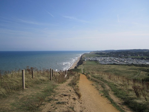 West Runton from Beeston Bump, North Norfolk, England, UK. Shabbily rugged bit of coastline.