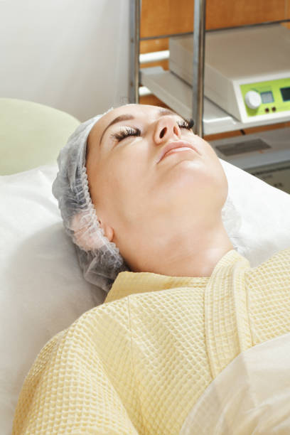 istock Woman on beautician couch 1055451892