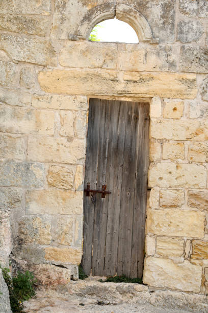 istock Old wooden door 1055457236