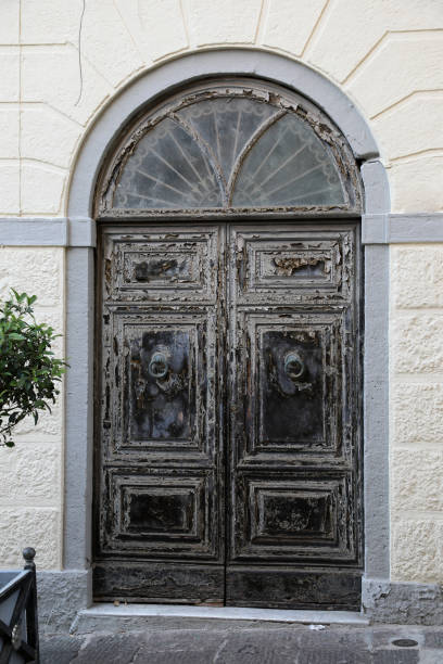 istock Old wooden door 1055457254