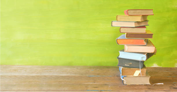 istock stack of books, panorama, good copy space, education,reading,back to school concept 1055459486