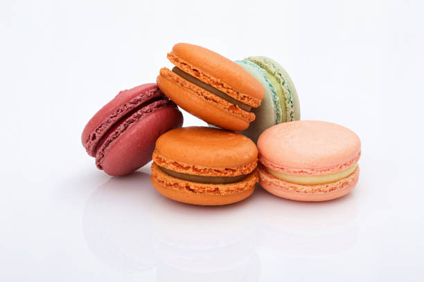 istock lot of colorful macarons on white background 1055460152