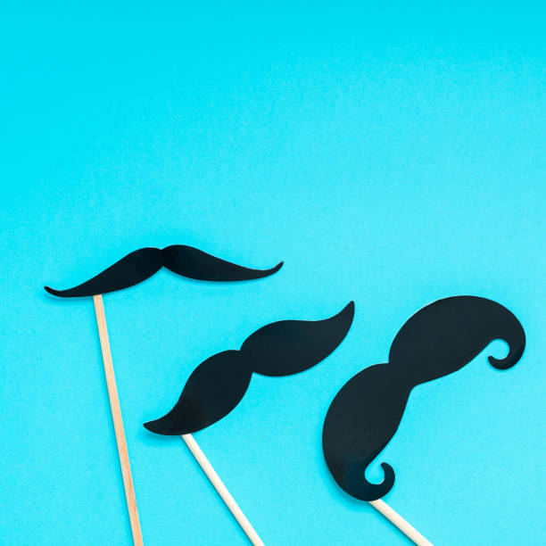 istock Paper moustaches for men fathers dad concept 1055464636