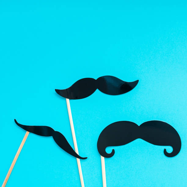 istock Paper moustaches for men fathers dad concept 1055464712