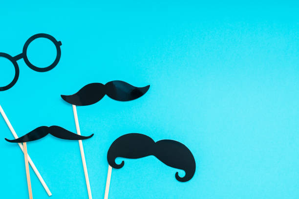 istock Paper moustaches for men fathers dad concept 1055464786