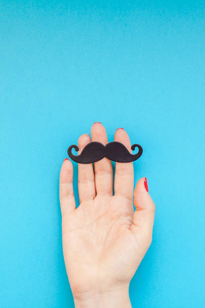 istock Paper moustaches for men fathers dad concept 1055465300