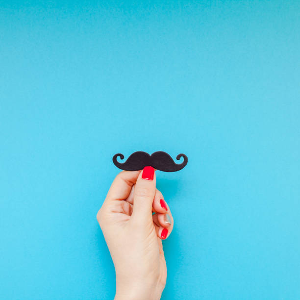 istock Paper moustaches for men fathers dad concept 1055465340