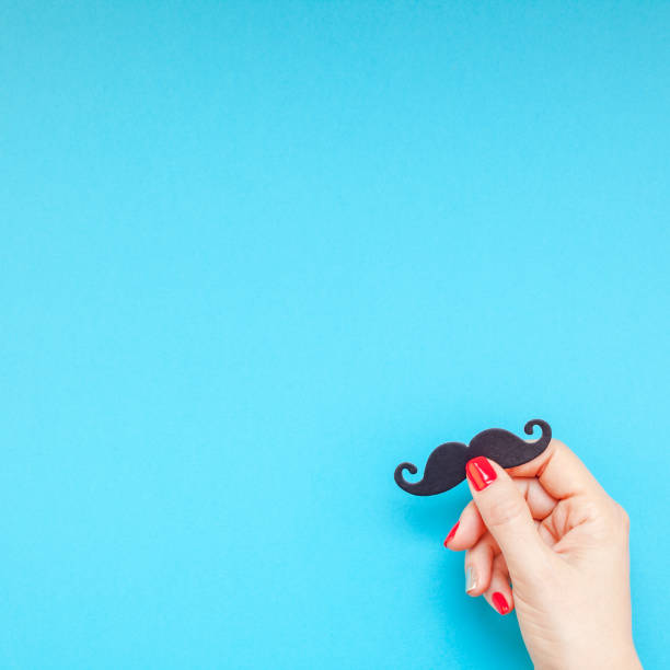istock Paper moustaches for men fathers dad concept 1055465536