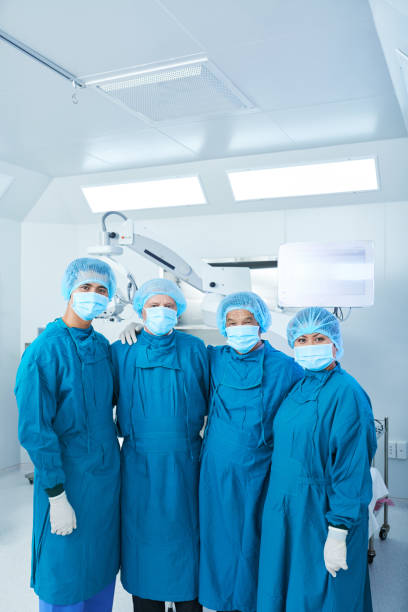 istock Surgical team in operating theatre 1055469256