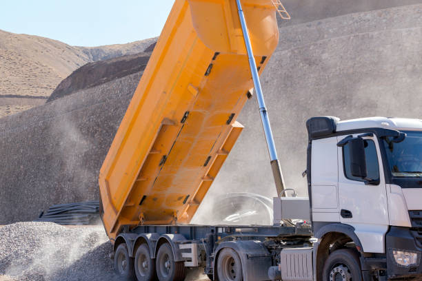 istock The truck unloads pebbles in the construction site. Rounded or partially rounded rock or mineral fragments between 2 and 75 mm in diameter Size may be further refined as fine pebbles ( 2-5 mm diameter ). 1055469858