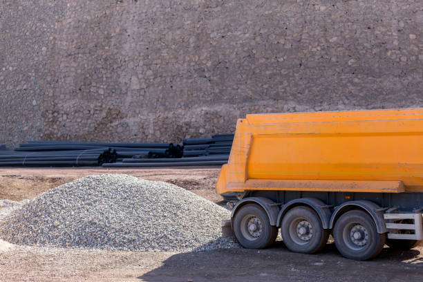 istock The truck unloads pebbles in the construction site. Rounded or partially rounded rock or mineral fragments between 2 and 75 mm in diameter Size may be further refined as fine pebbles ( 2-5 mm diameter ). 1055470104