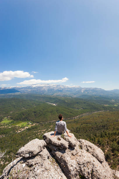 istock Traveler Sitting at the Edge 1055470816