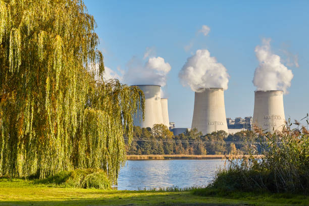 istock Smoking chimneys and nature. 1055474038