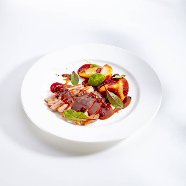 istock Duck Breast with Baked Apple and Peach Cream 1055475614