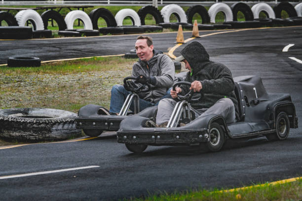 istock Karting circuit, man, woman. 1055476980