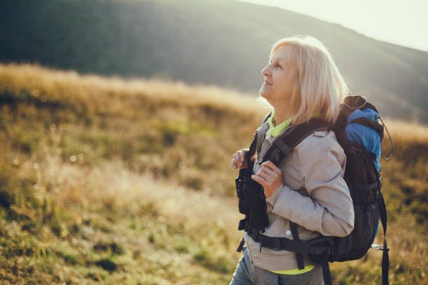 istock Active senior woman in mountain 1055477472