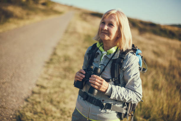 istock Active senior woman in mountain 1055477678