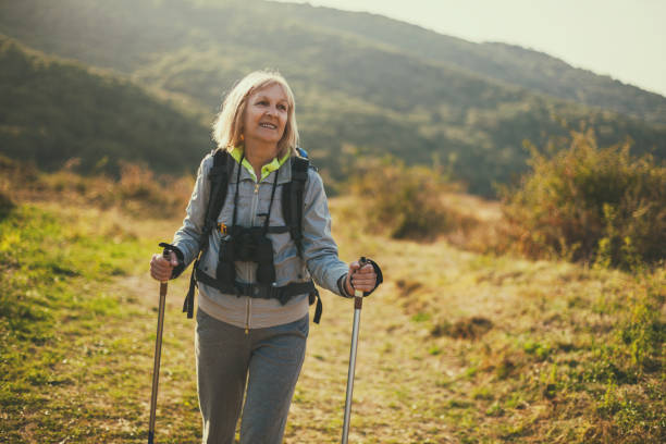 istock Active senior woman in mountain 1055479358