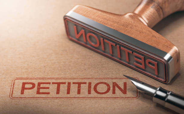 istock Word Petition over Kraft Paper Background 1055492874