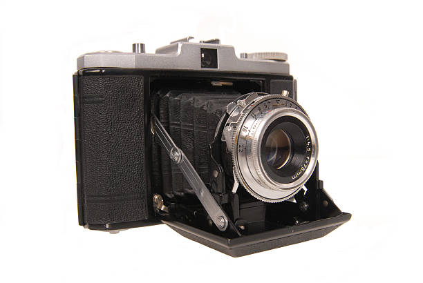 istock old photo camera isolated on white background 105549293
