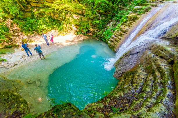Erfelek Waterfalls with People from National Park, Sinop Sinop, Turkey. The waterfalls near the Tatlıca village of Erfelek district of Sinop are. Tatlıca hosts 28 different waterfalls of various sizes. sinop province turkey stock pictures, royalty-free photos & images
