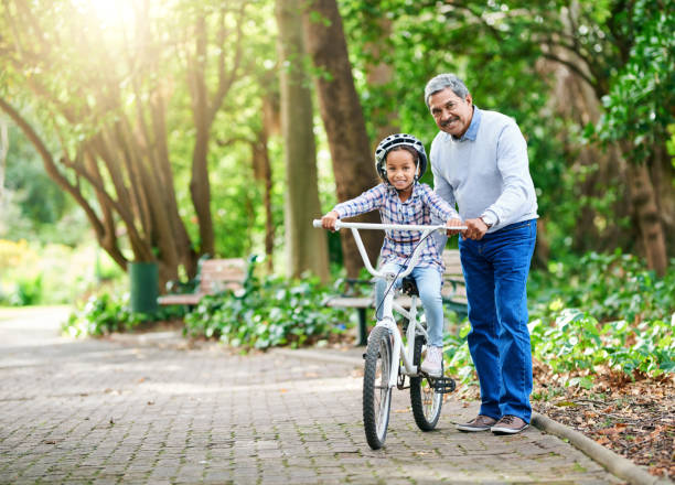 istock Teaching her how to ride a bike 1055498990