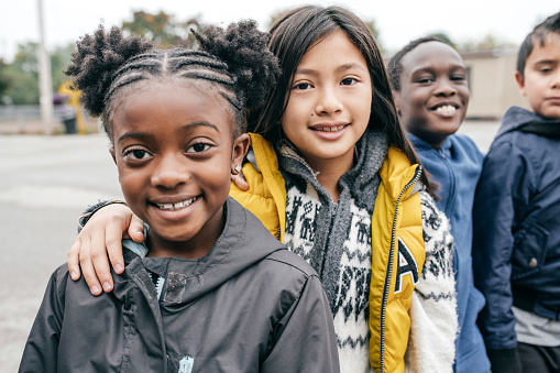 Group of kids standing in a row