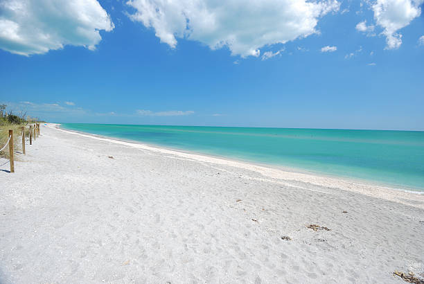 Island Beach Vacation An idyllic beach spot on Sanibel - Capitva Island sanibel island stock pictures, royalty-free photos & images