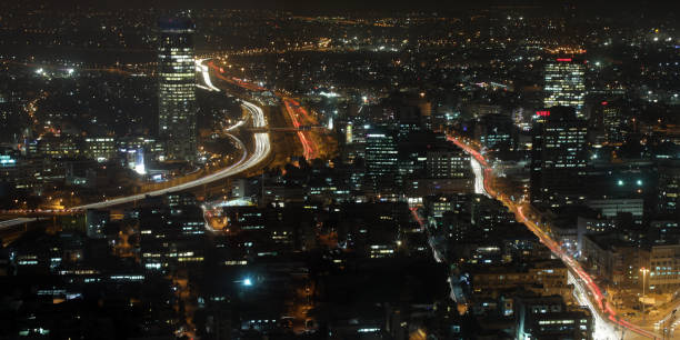 istock Modern office building downtown cityscape skyscraper skyline aerial view night 1055510778