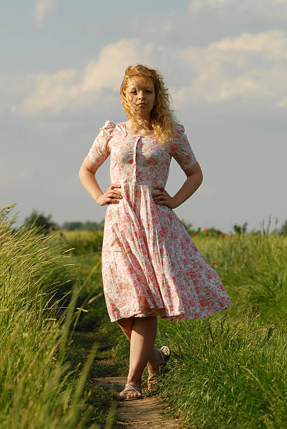 istock young girl on the meadow 105551178