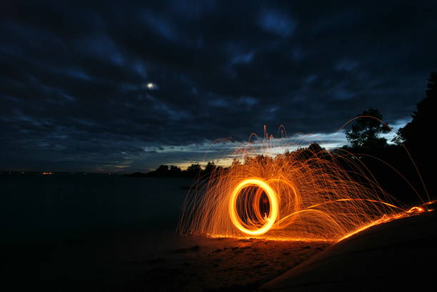 istock Lightpainting at the beach 1055513688
