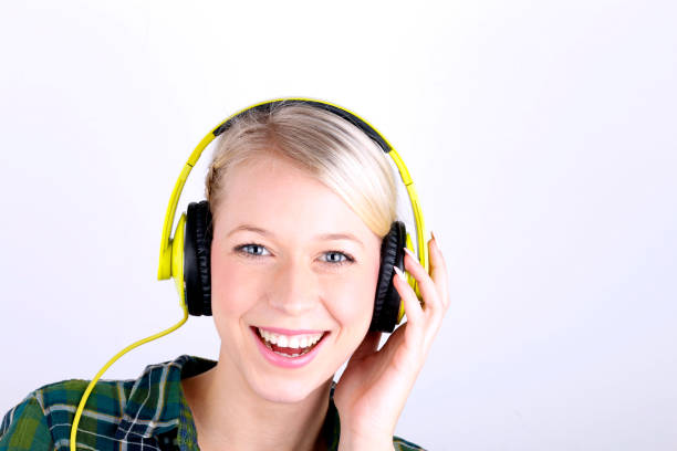 Beautiful woman with headphones listening music