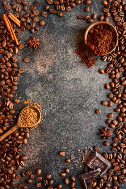 istock Ground coffee and coffee beans with spices 1055517646