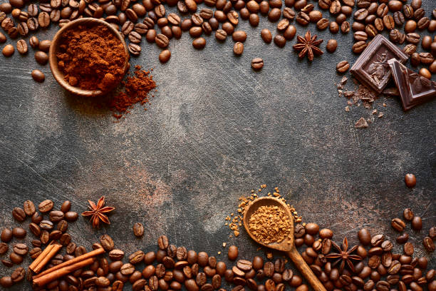 istock Ground coffee and coffee beans with spices 1055517684
