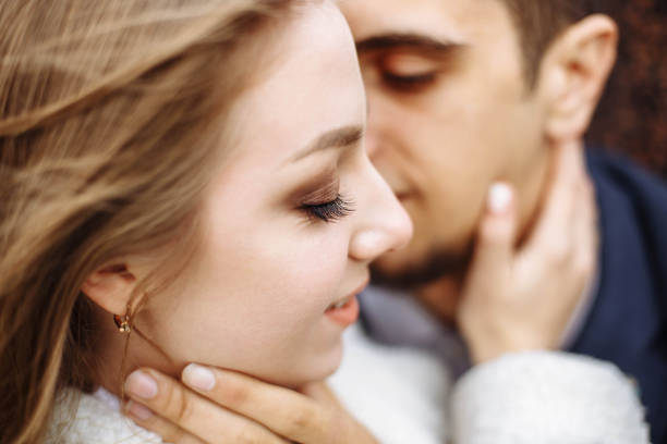 istock Young couple hugging. Shallow depth of field. 1055520508