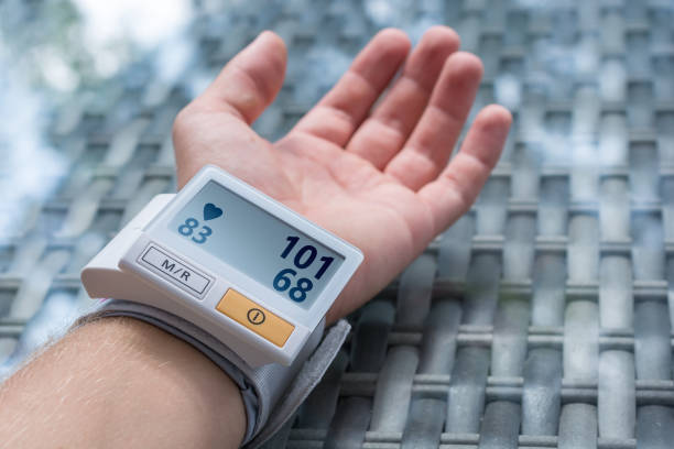 Blood pressure monitor indicates low blood pressure health lower technology stock pictures, royalty-free photos & images