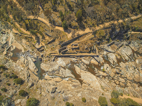 Looking down at historic gold mill ruins in Adelong, NSW, Australia