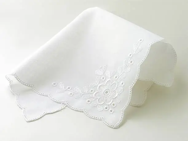 Photo of romantic batist white handkerchief