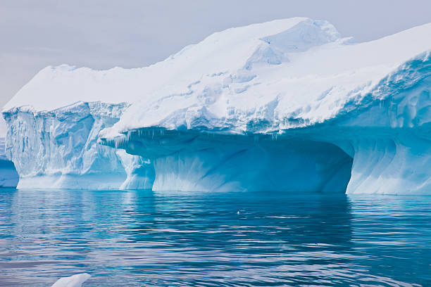 Iceberg near Cuverville Island, Antarctica  paradise bay antarctica stock pictures, royalty-free photos & images