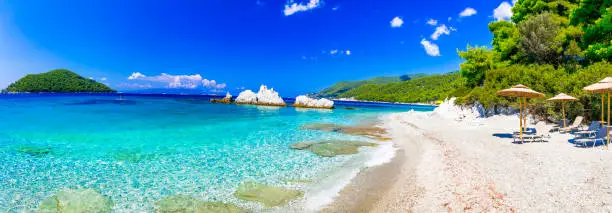 Photo of Best beaches of Skopelos island - relaxing Milia beach. Sporades, Greece