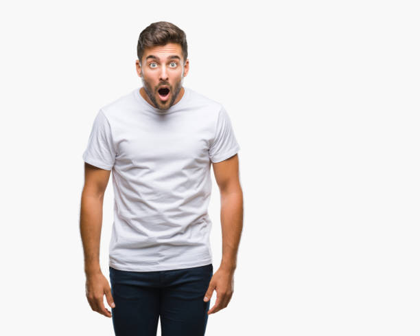 istock Young handsome man over isolated background afraid and shocked with surprise expression, fear and excited face. 1055547620
