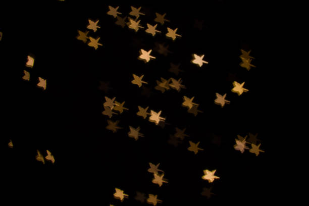 istock abstract stars, light bokeh background 1055550546