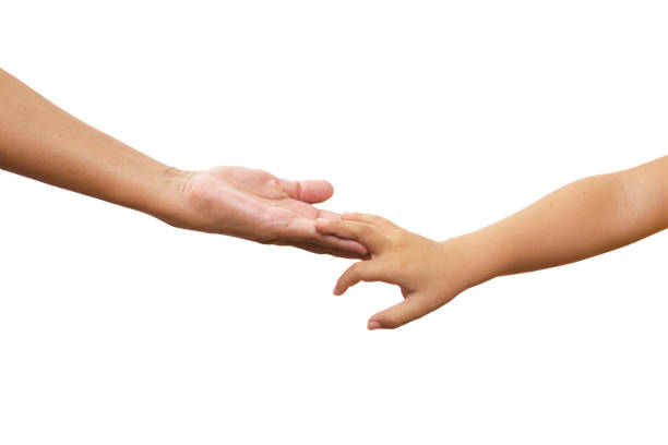 istock Young mother Hand with her sons hand 1055550846