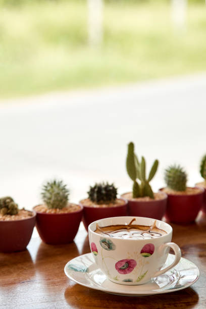 istock Classic Italian cappuccino cup with topping decoration pattern, close up 1055553410