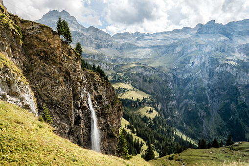 Waterfall in the mountains, from Kiental to Lauterbrunnen, Switzerland